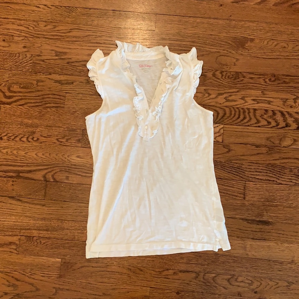 White sleeveless ruffle top